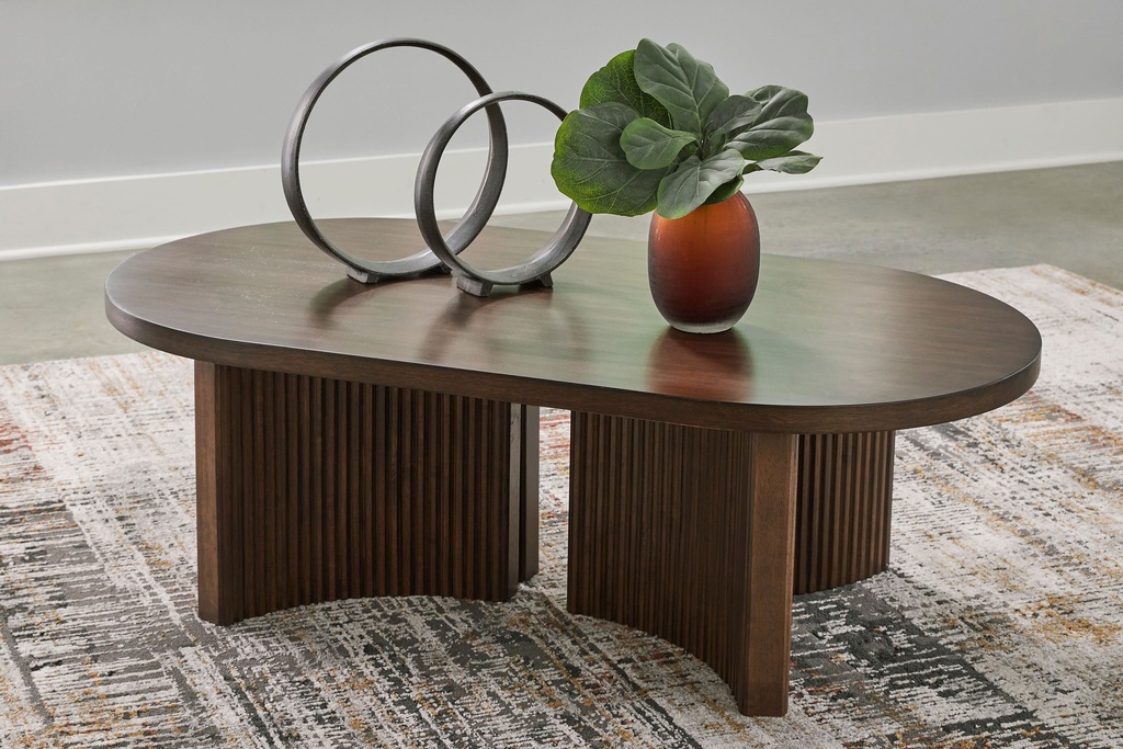 Ashley Korestone Oval Cocktail Table - Dark Brown